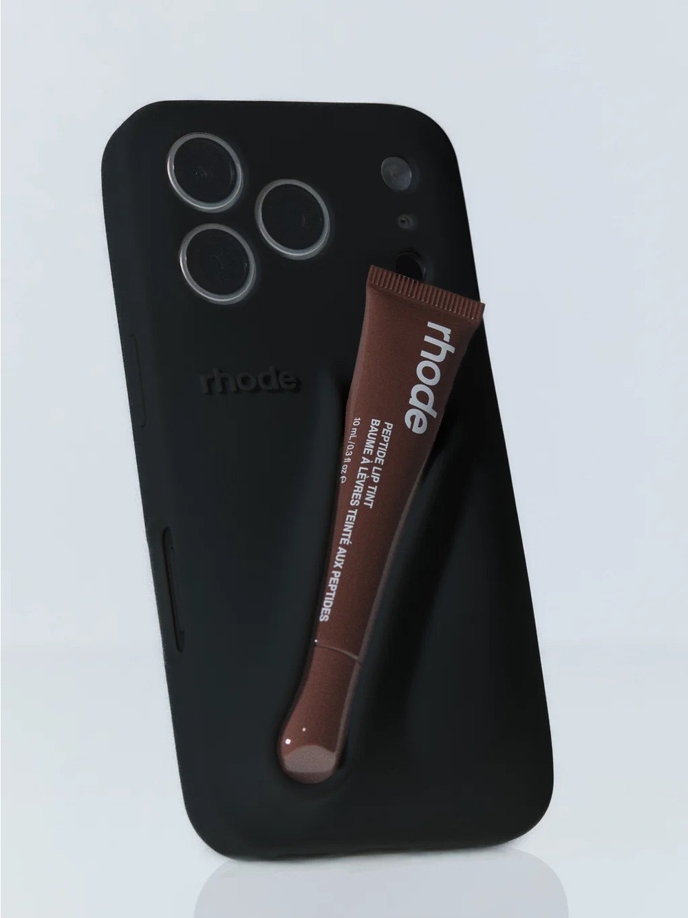 RHODE Black Silicone Phone Case with Brown Lip Tint Sleeve